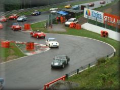 The midfield cars enter the busstop for the first time